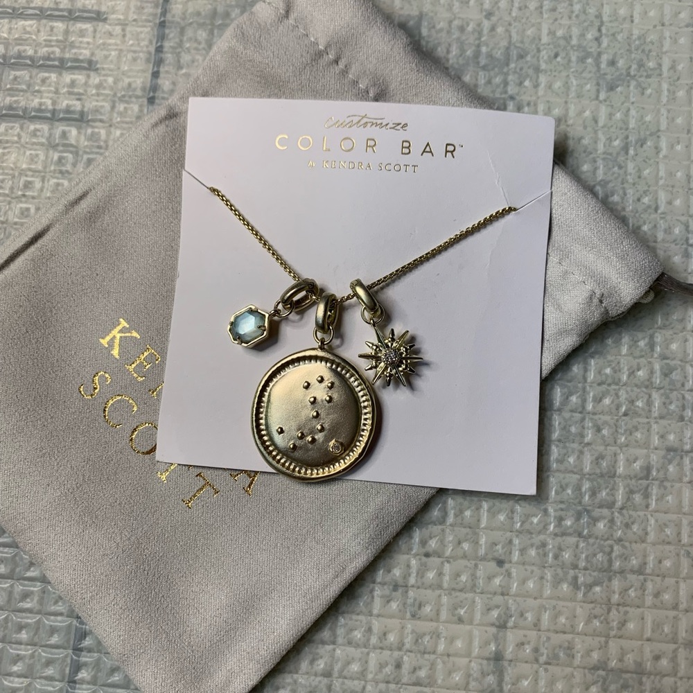 Kendra Scott gold long Pisces constellation necklace